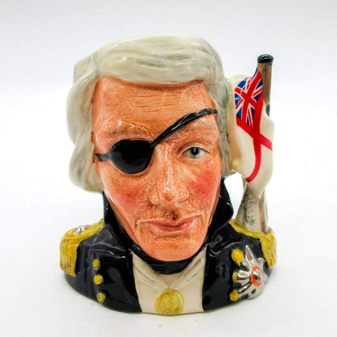 Nelson D6963 - Small - Royal Doulton Character Jug: Black, white, red, and gold coloration. Issued by the Royal Doulton International Collectors Club, the Nelson jug was available only to their members from 1994 to March 1995. Series: RDICC. Royal Doul