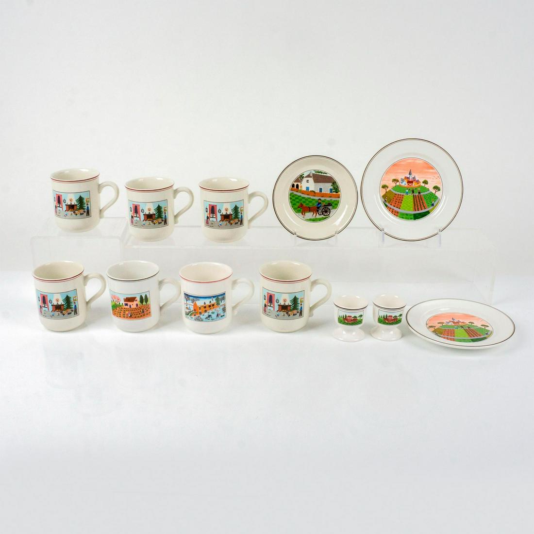 12pc Villeroy & Boch Coffee Set, Naif Designs: Ceramic coffee mugs and plates with naif designs depicting agrarian and Christmas scenes. Set includes, two egg cups, three small plates, and seven mugs. Mugs are all Christmas themed. Largest plate 6