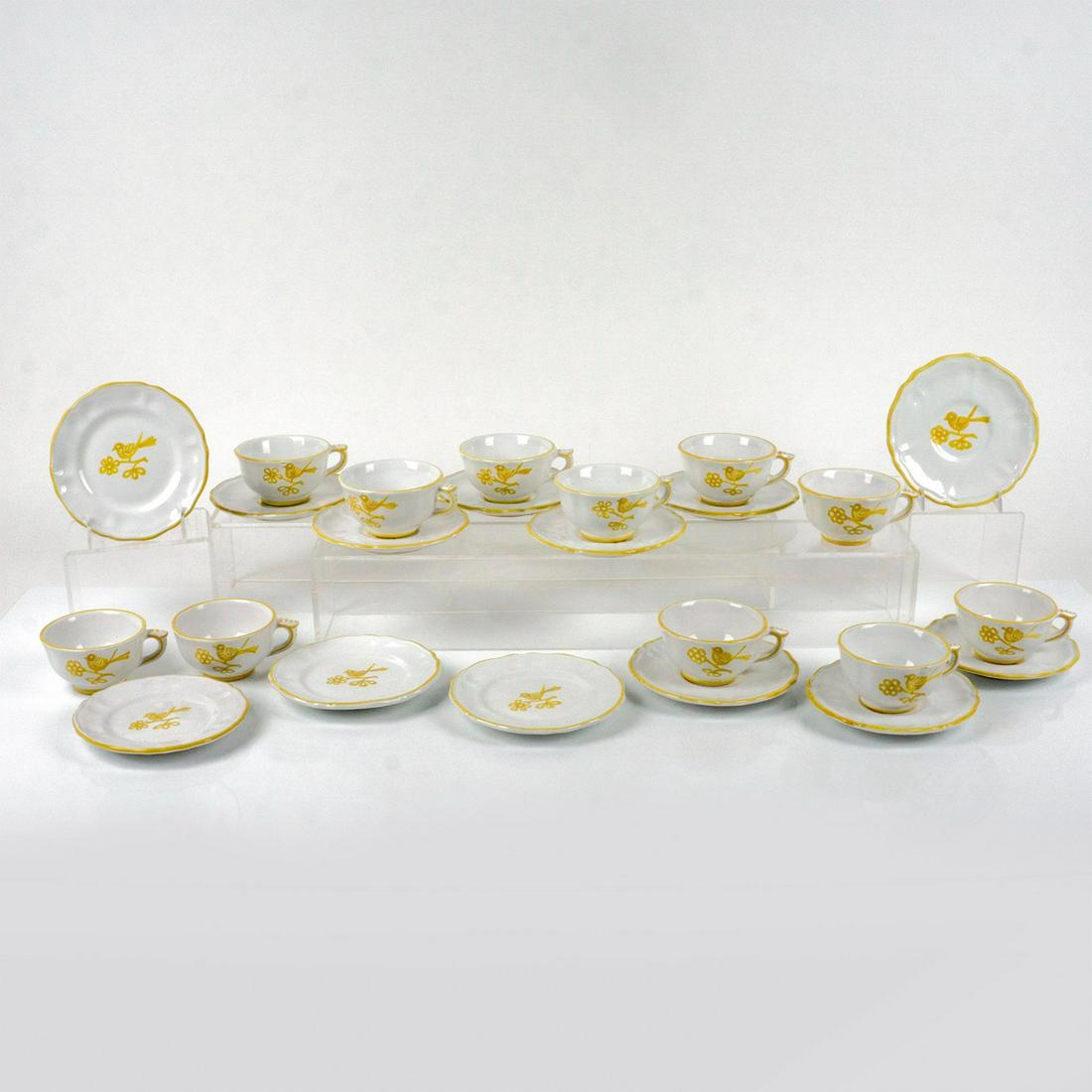 24pc Maioliche Deruta Cups, Saucers, Bread & Butter Plates: Vintage. Includes a set for nine, plus two additional cups, and four bread and butter plates. Glossy finish. In white with lovely yellow bird sitting on a branch design and yellow trim. Maioliche Deru