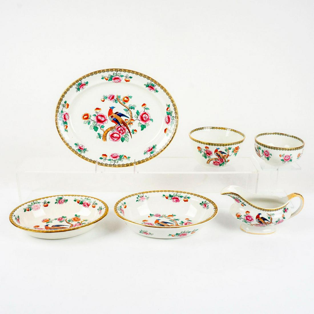 6pc F. Winkle & Co. Whieldon Ware Serveware, Pheasant: Serveware in a vibrant pheasant and floral motif with gold rim. Lot includes serving platter (largest) 12"L x 9.5"W x 1.25"H, bowl (tallest) 3"H x 5.5" diameter, two serving dishes, gravy boat and sma