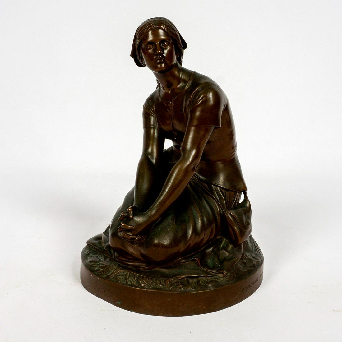 After Henri Chapu (French, 1833-1891) Bronze Sculpture: Sculpture with dark brown patination modeled as Joan of Arc seated in field. F. Barbedienne, Fondeur and h. Chapu inscribed to base. Dimensions: 9.75"L x 9.75"W x 13.5"H Edition Number: 953 Manufactur