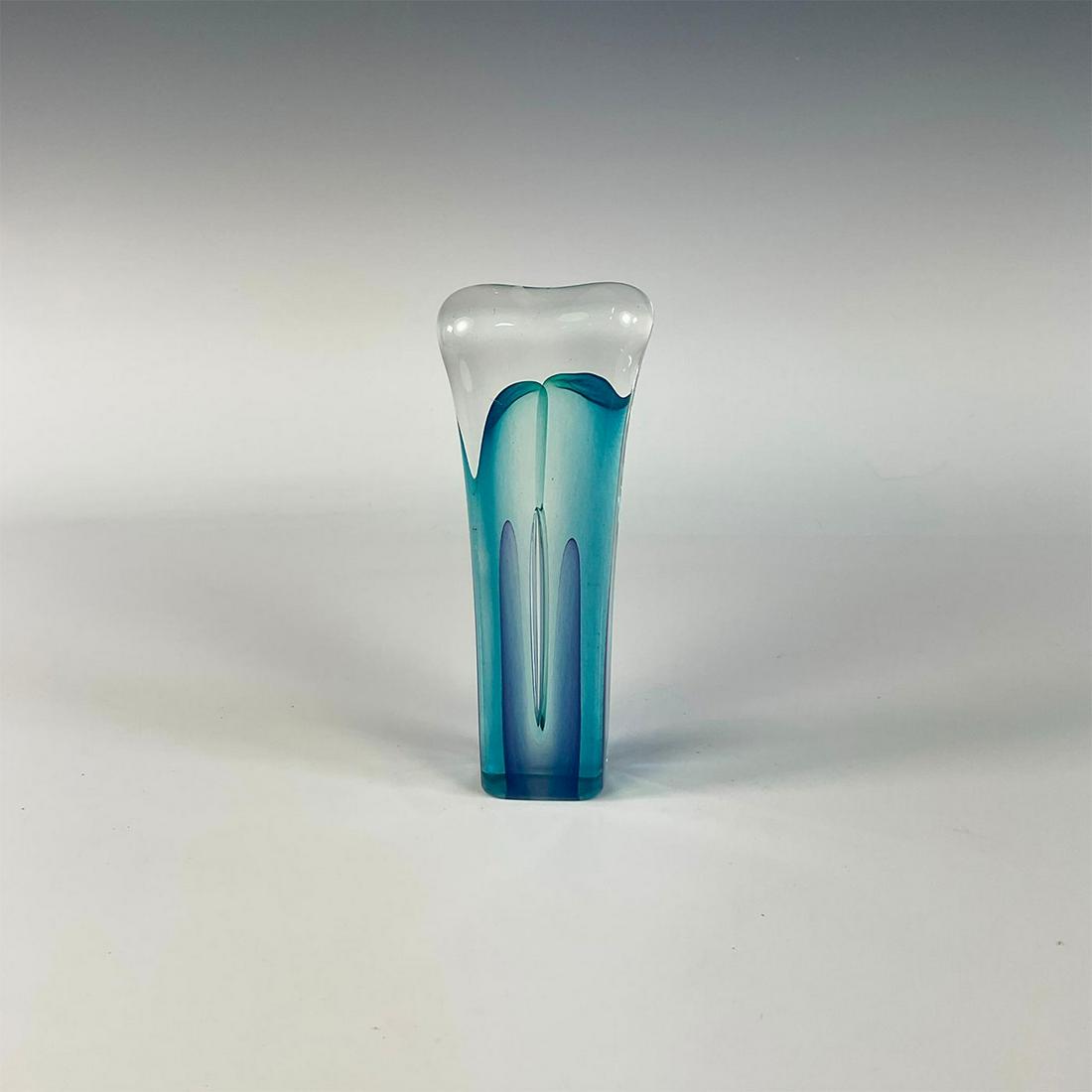 Signed Quintessence Art Glass Sculpture: Interesting handmade glass sculpture / paperweight with bone-like shape, layered blue and purple interior colors, and single bubble. Signed Quintessence to base. Artist: Quintessence Issued: 1991 Dime