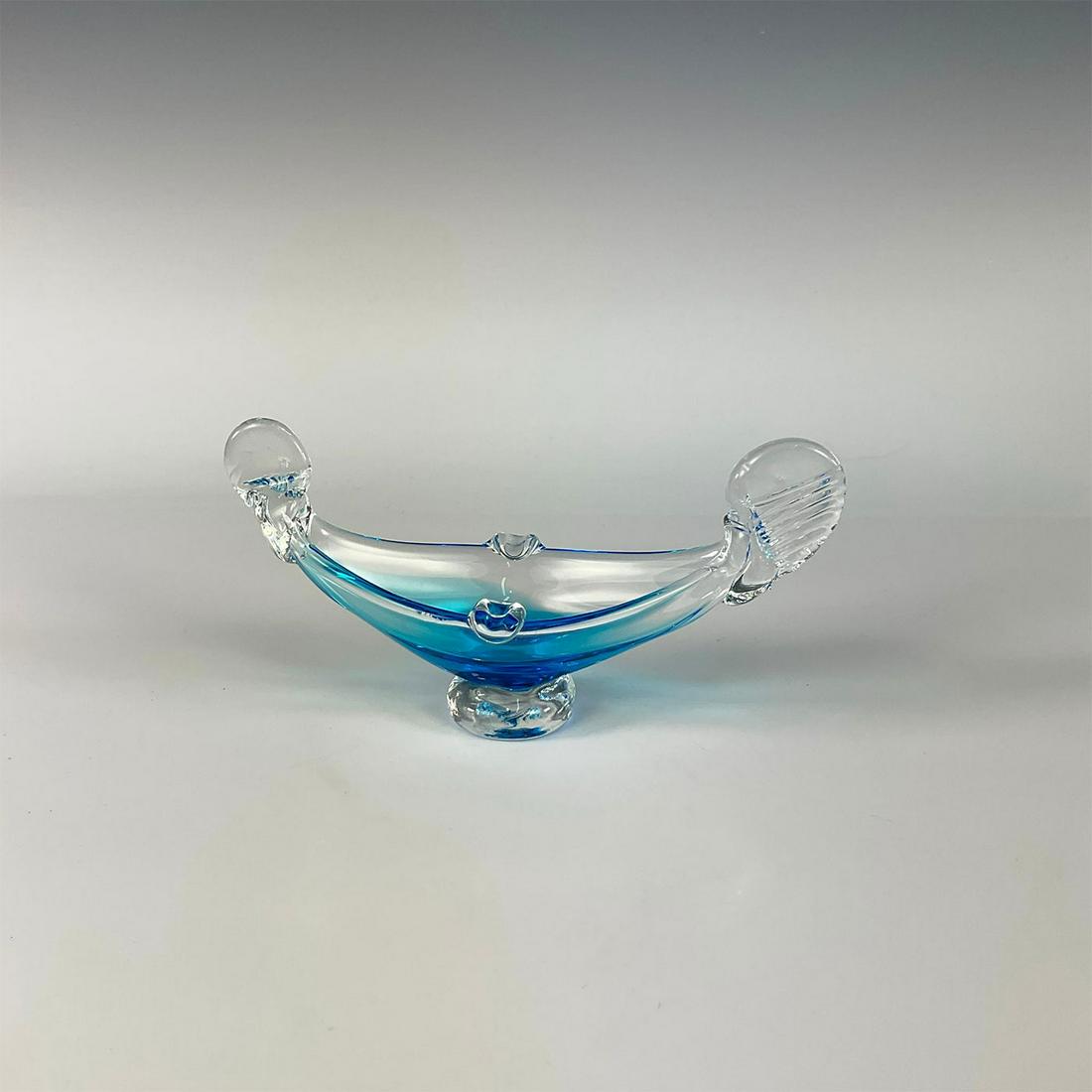 Vintage Art Glass Ashtray, Venetian Gondola: Alluring handmade art glass modeled as a long narrow boat with gradated lagoon blue coloration and two cigarette rests. Dimensions: 7.25"L x 2.75"W x 3.5"H