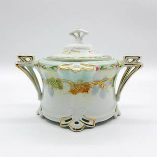 Vintage Moritz Zdekauer Lovely Porcelain Lidded Sugar Bowl: Two-handled delightful piece. Gilt accented trim with floral decoration. Cut-out pattern design around footed base. M Z Austria backstamp. Dimensions: 6"W x 4"H x 3"Dia. Manufacturer: Moritz Zdekauer