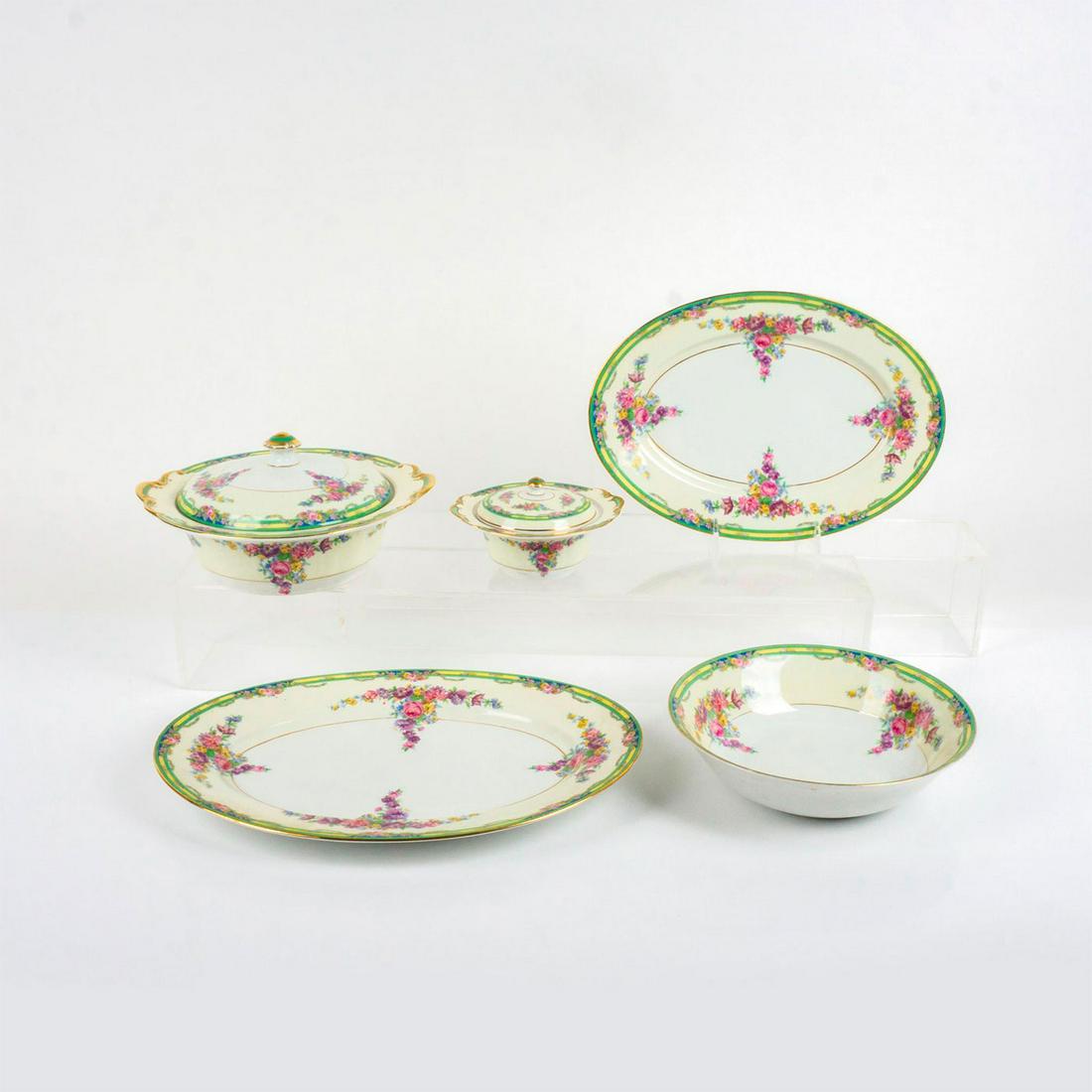 5pc KPM Porcelain Serveware, Pattern 5104: Serving dishes in colorful motif with pink, purple and yellow flowers, green borders. KPM backstamp. Serving platter 12.75â€ L x 9"W, larger serving platter 15â€ L x