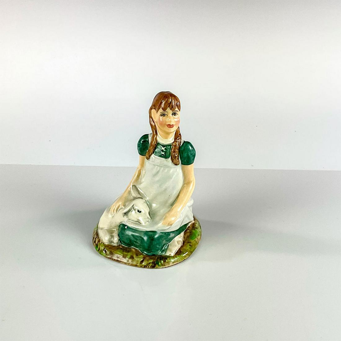Heidi - HN2975 - Royal Doulton Figurine: Artist: Amanda Hughes Issued: 1983 - 1985 Dimensions: 4.5"H Manufacturer: Royal Doulton Country of Origin: England