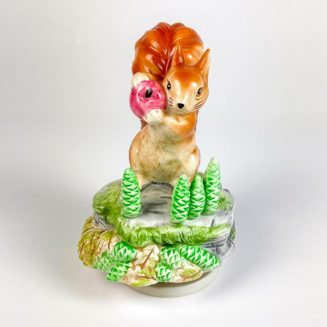 Vintage Schmid Musical Figurine Box, Tale Of Squirrel Nutkin: Beatrix Potter Collection. Musical Collectibles. Plays "Raindrops Keep Falling On My Head" tune. F. Warne & Company and Schmid backstamps. Issued: 1978 Dimensions: 6.25" H Manufacturer: Schmid