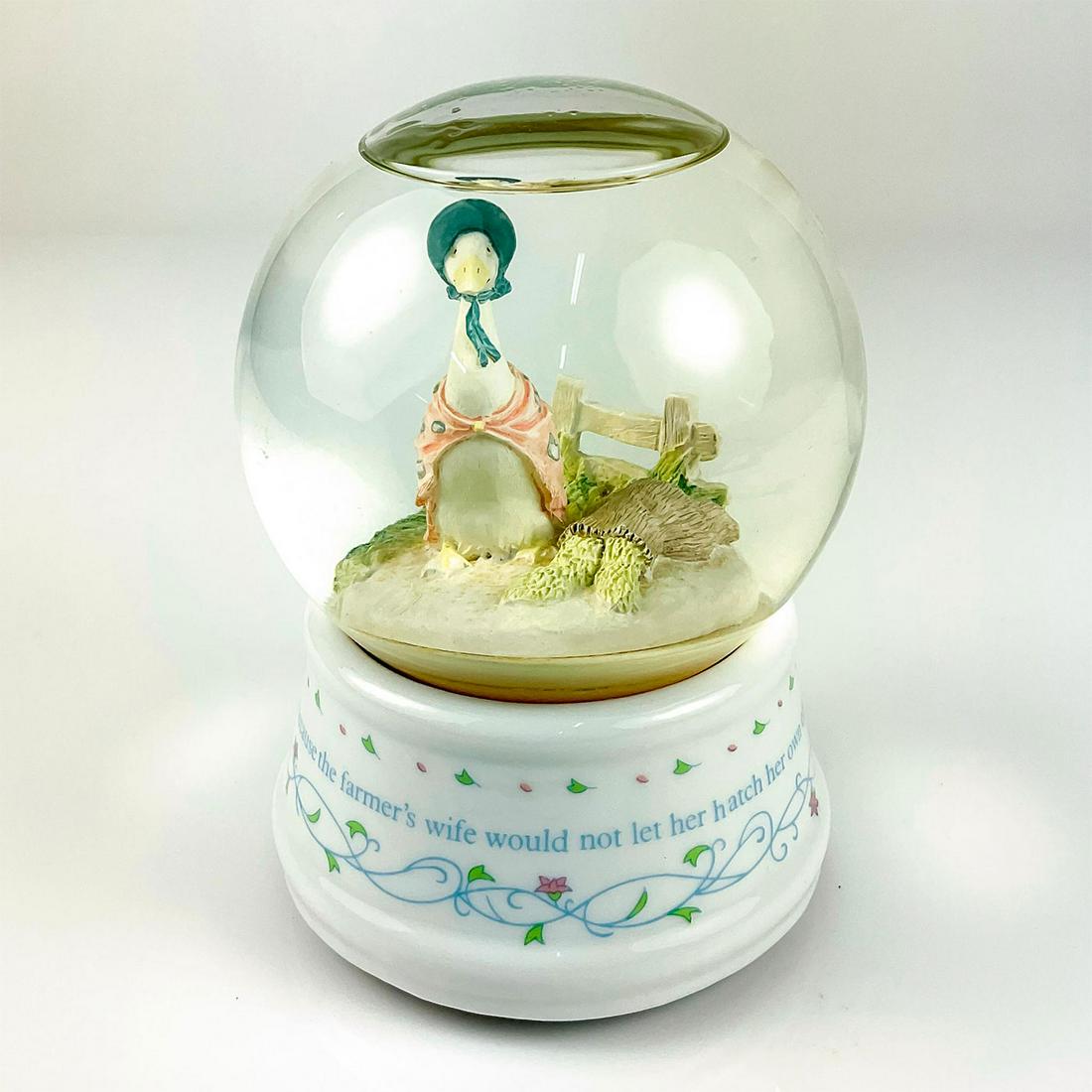 Schmid Beatrix Potter Musical Globe, Jemima Puddle-Duck: Vintage. Depicts character standing beside a sack of vegetables. With quote printed around globe. Plays tune "Younger than Springtime." Schmid and F. W. & Co factory stickers. Dimensions: 5.5" H Manuf
