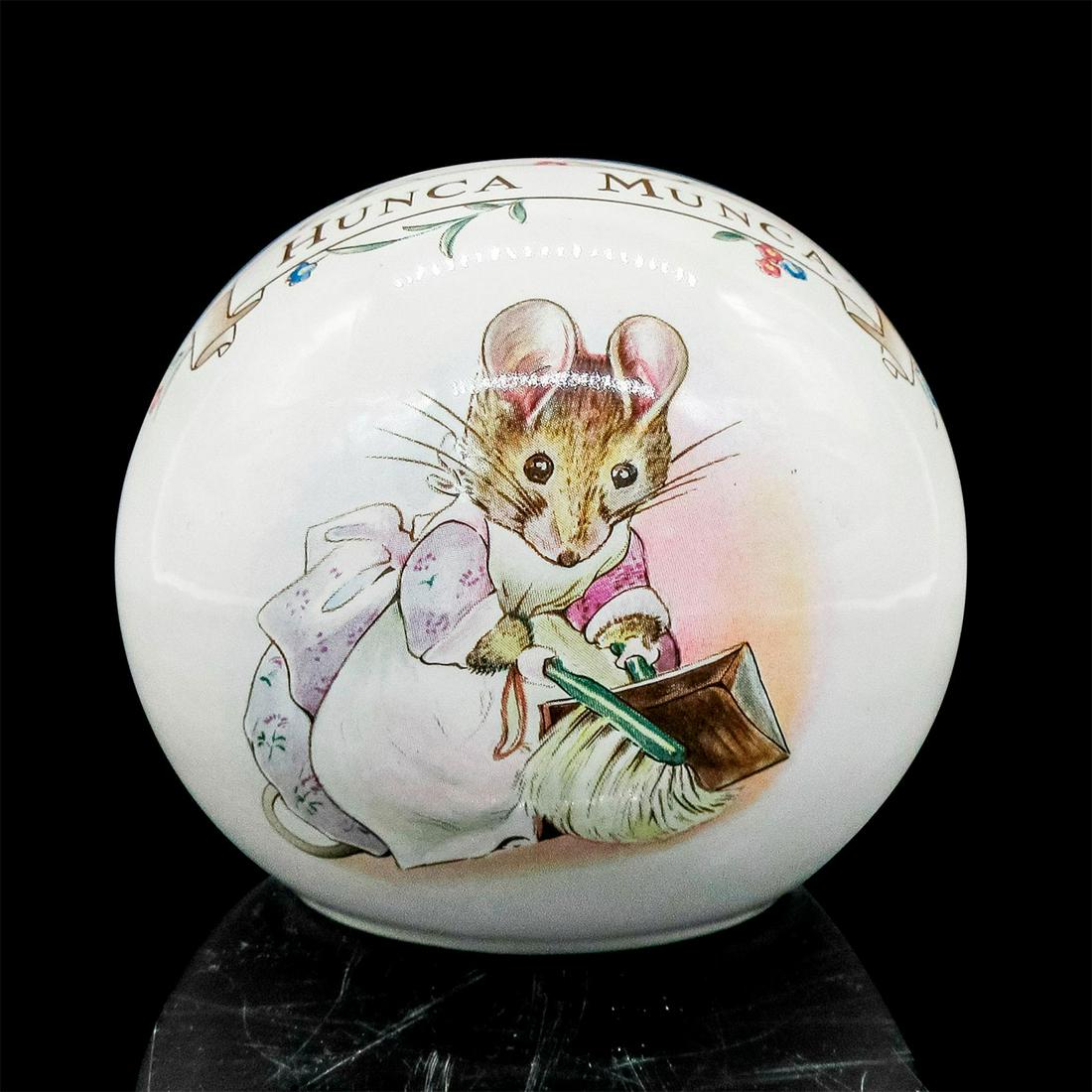 Hunca Munca Porcelain Ball Money Bank: Image of Hunca Munca. The World of Beatrix Potter Design. F.W.&Co backstamp 1986. Issued: 1986 Dimensions: 3" H Country of Origin: England