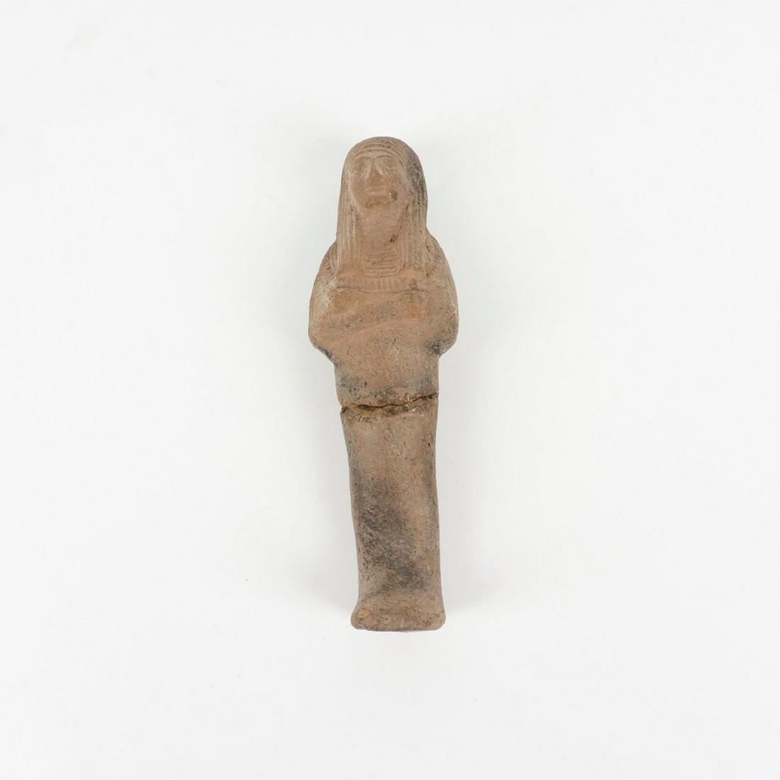 Ancient Egyptian Ushabti Tomb Figure with Stand: Rare 26th to 31st Dynasty impressive tomb piece, mold-formed faience ushabti figure in mummiform position: feet and legs fused together on an integral plinth, arms crossed, facing forward. Issued: ca.