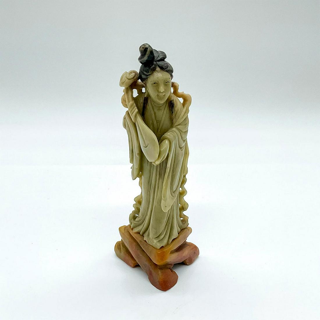 Vintage Chinese Soapstone Musician Figurine: Carved stone of lady in a flowing robe holding a pipa in her hands. Attached to a stone base. Dimensions: 2.5"L x 2"W x 6"H Country of Origin: China