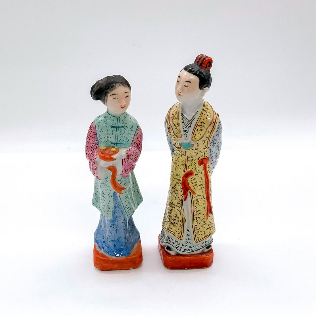 Pair of Chinese Porcelain Famille Rose Figurines: Includes a lady depicted wearing colorful robes and holding a bowl, and one man dressed in robes with a thoughtful pose. Both are attached to their bases. Dimensions of tallest figurine: 1.5 in. L x 1