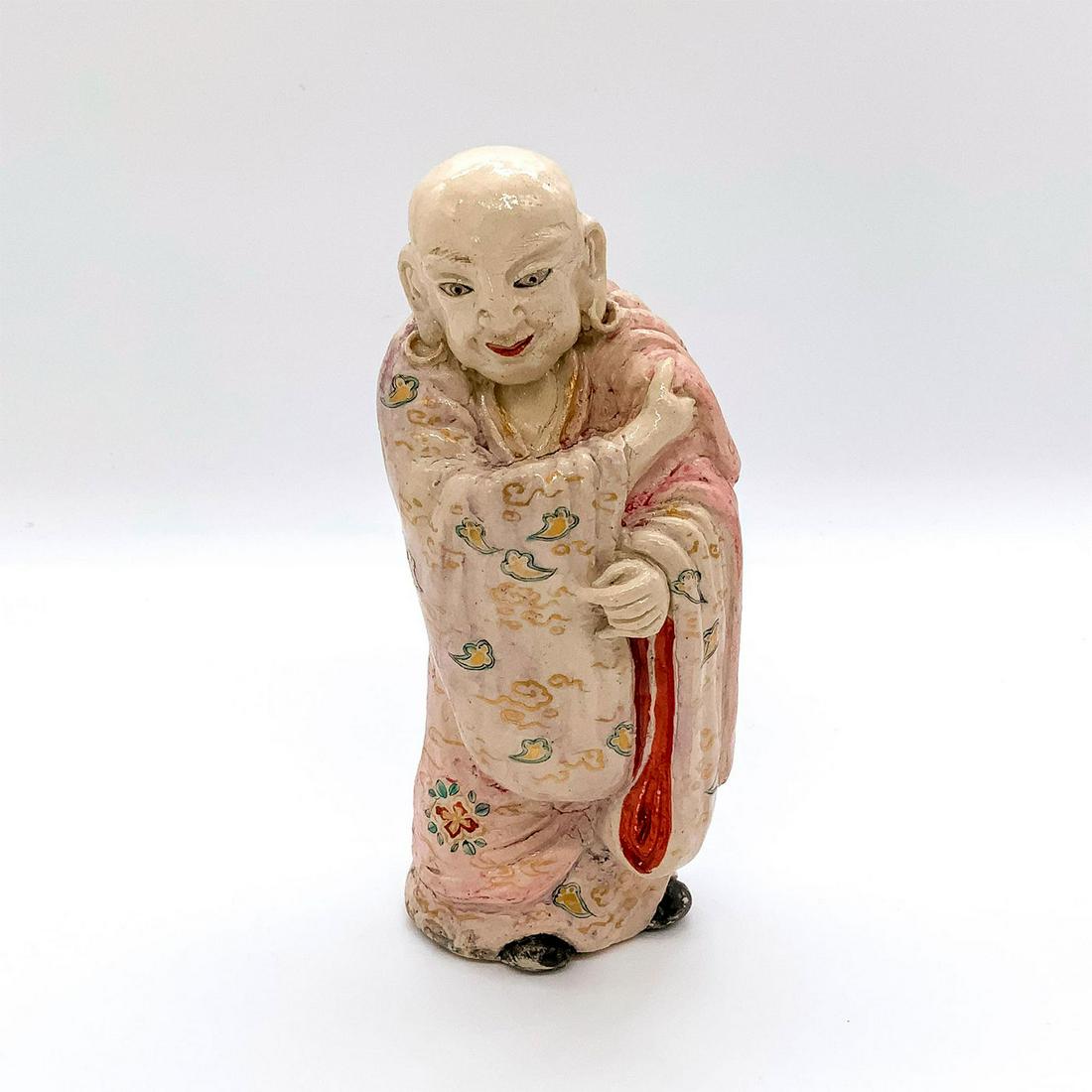 Asian Stoneware Figurine, Wise Man: Depicts older man wearing flowing robes decorated with floral design and gilt accents. Dimensions: 3"L x 2.5"W x 7"H