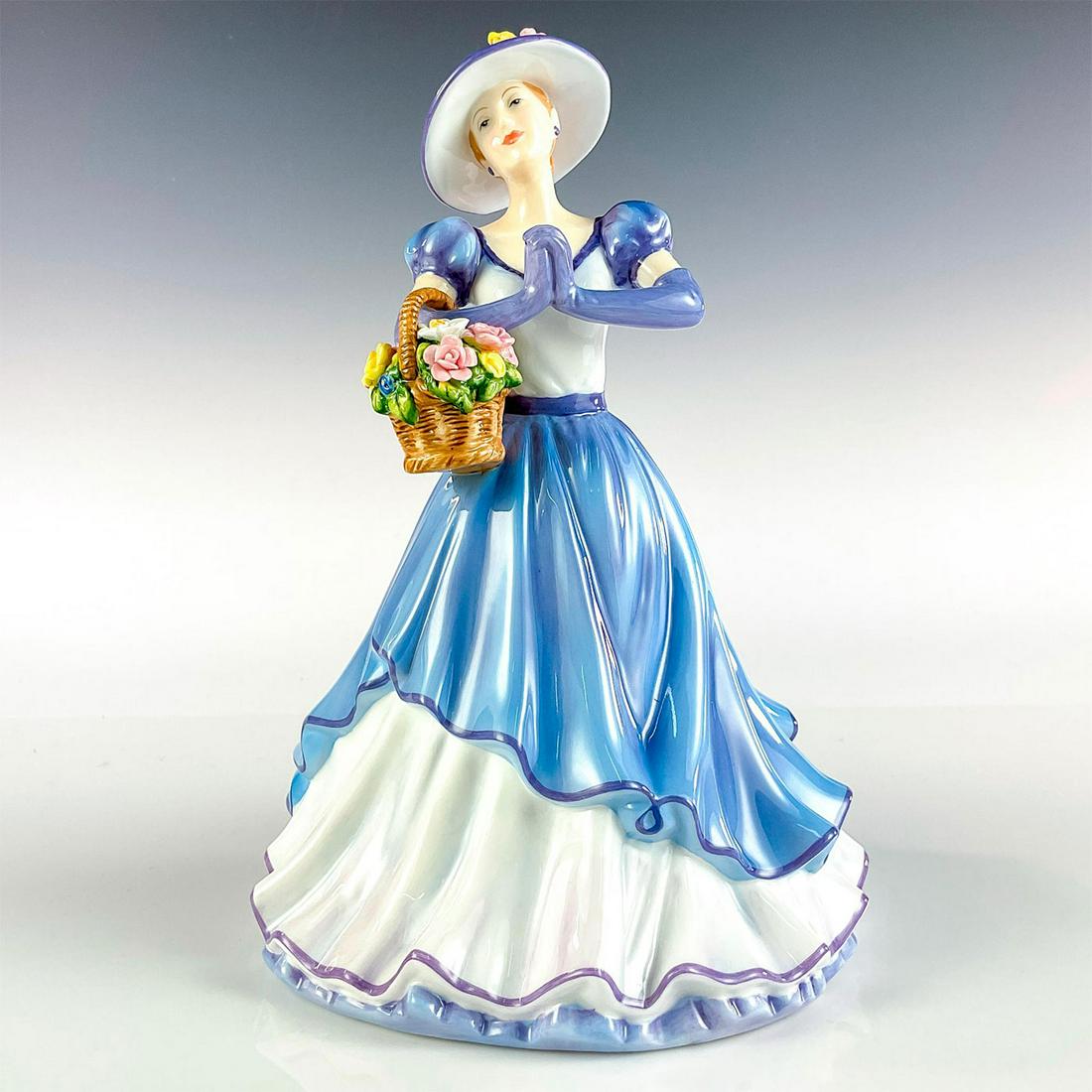 Happy Birthday 2011 - HN5428 - Royal Doulton Figurine: Artist: Neil Faulkner Issued: 2011 Dimensions: 8.75"H Manufacturer: Royal Doulton Country of Origin: England
