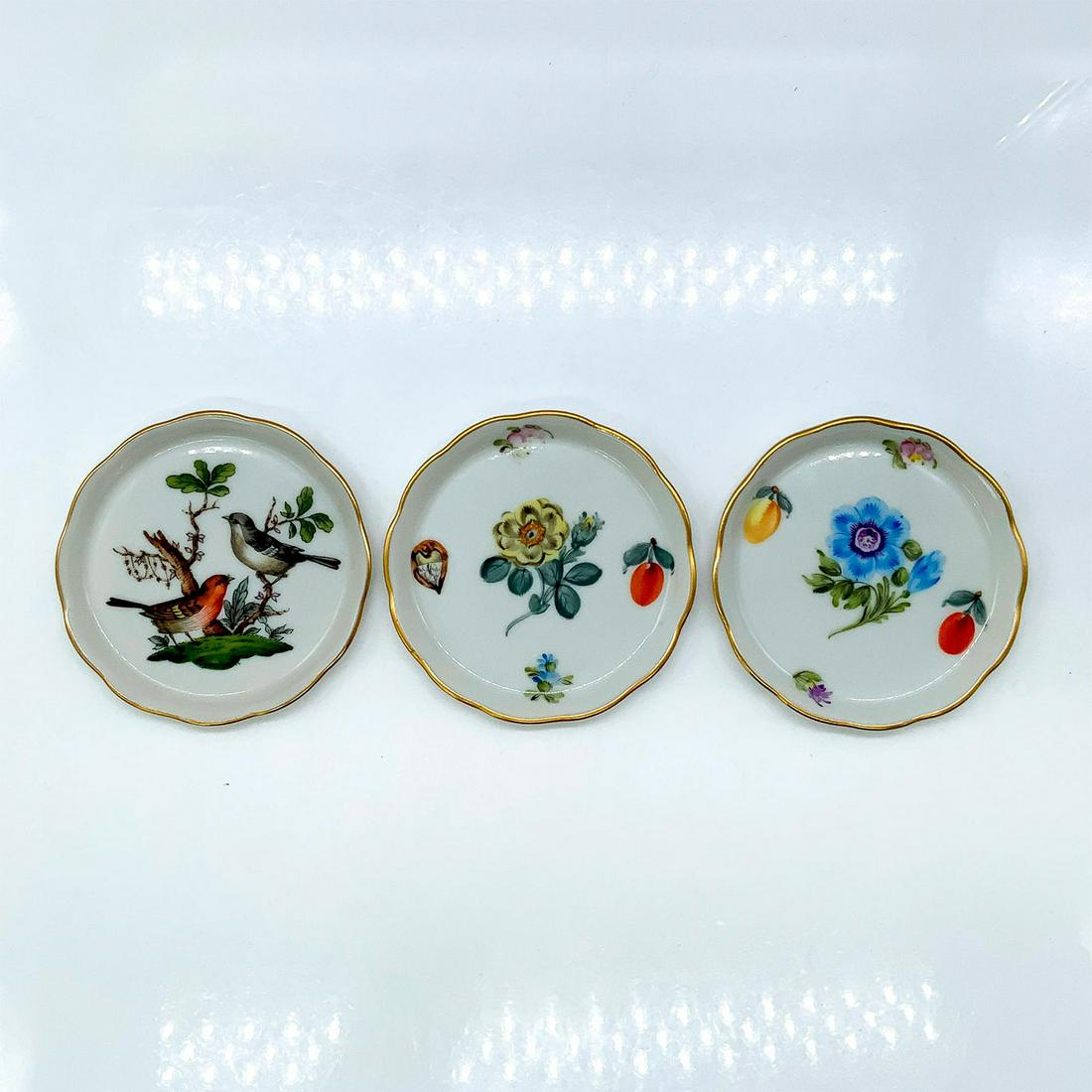 3pc Herend Mini Round Trays: Beautifully decorated with floral and bird design. Gold trim to scalloped rim. Herend backstamp. Marked 7562/FRN and 7562/RO. Issued: 20th c. Dimensions: 0.25"H x 3"Dia. Manufacturer: Herend Country o