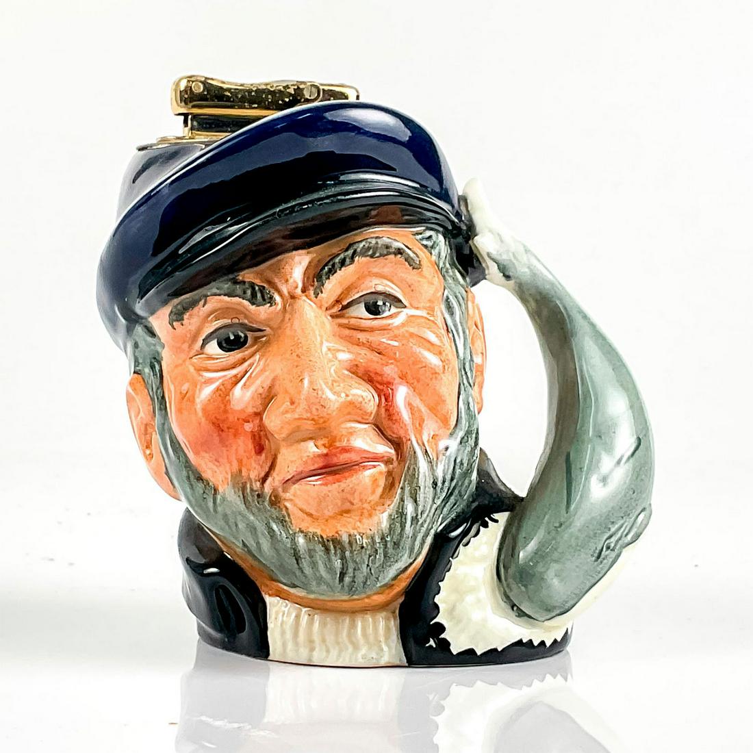 Royal Doulton Character Table Lighter, Capt. Ahab: Porcelain character lighter of the Moby Dick antagonist character. The lighter is removeable and refillable. Royal Doulton backstamp. Issued: 20th c. Dimensions: 4.25" H Manufacturer: Royal Doulton Co