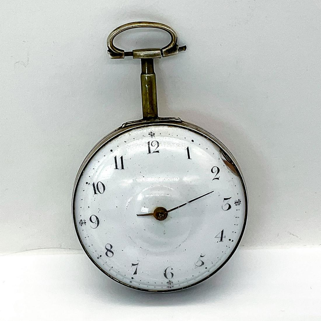 Antique Pocket Watch, Sterling Silver: Mid 1700s to early 1800s pocket watch with enamel face. Housed in sterling silver casing with glass front. Untested. Main spring chain intact. Balance wheel moves freely. Silver hallmarks on inner bac