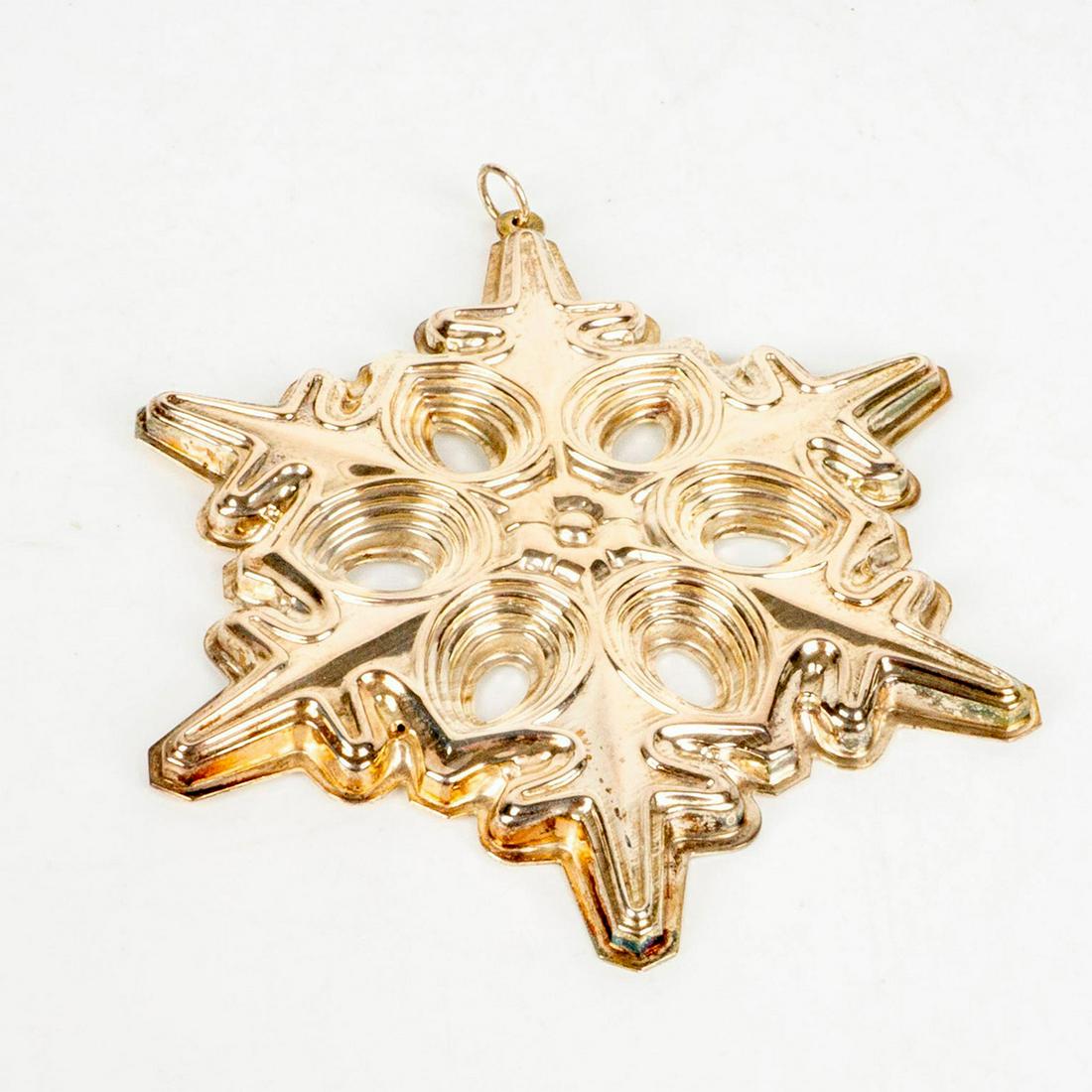 Gorham Sterling Silver 1991 Christmas Ornament, Snowflake: Gorham 925 sterling silver. Weight 26 grams. Comes with original pouch. Dimensions: 3"W x 3.5"H High Res Image 1