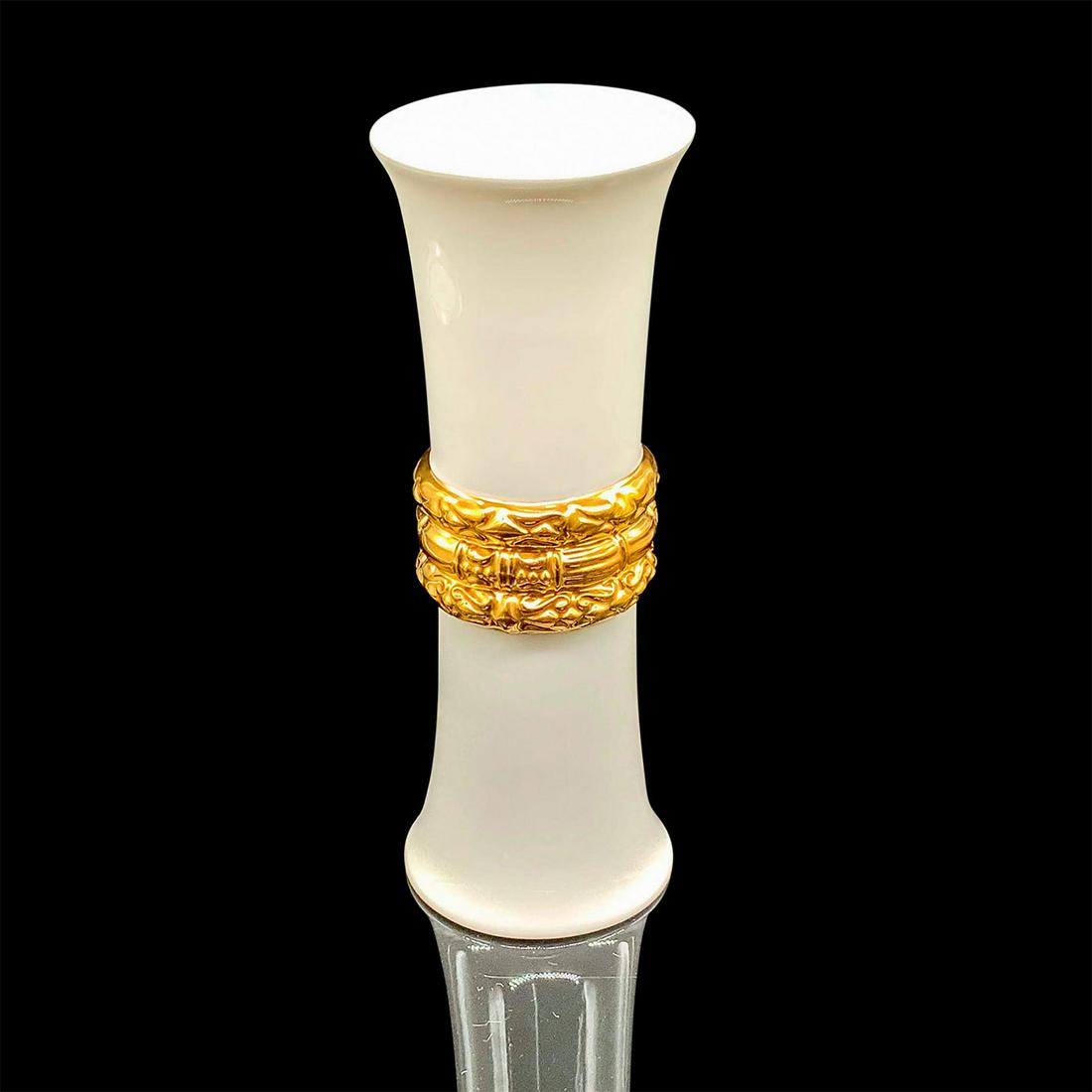 Katy Briscoe White Bone China Vase, Bangles: Glazed bone china with bisque �Bangles� design on the outer side. Katy Briscoe backstamp. This item has its original box with dimensions of: 8.75 in. L x 4.25 in. W x 3.5 in. H. Issued: 