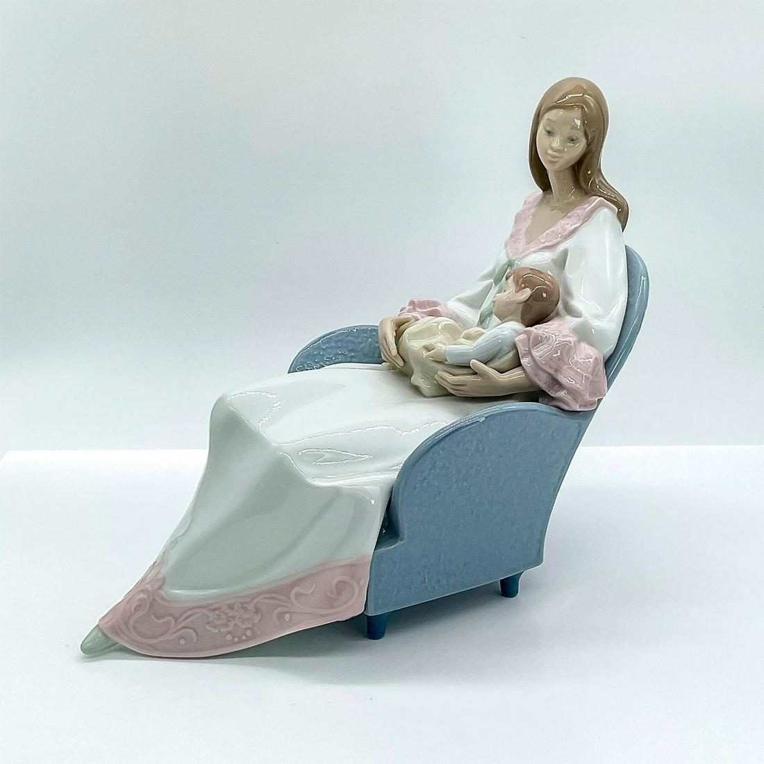 My Little Treasure 1006503 - Lladro Porcelain Figurine: Glossy figure of a mother cradling her child to sleep. Lladro backstamp. Original box 11"L x 13.25"W x 11"H. Issued: 1998-2004 Dimensions: 4.75"L x 8.25"W x 8"H Manufacturer: Lladro Country of Origin: