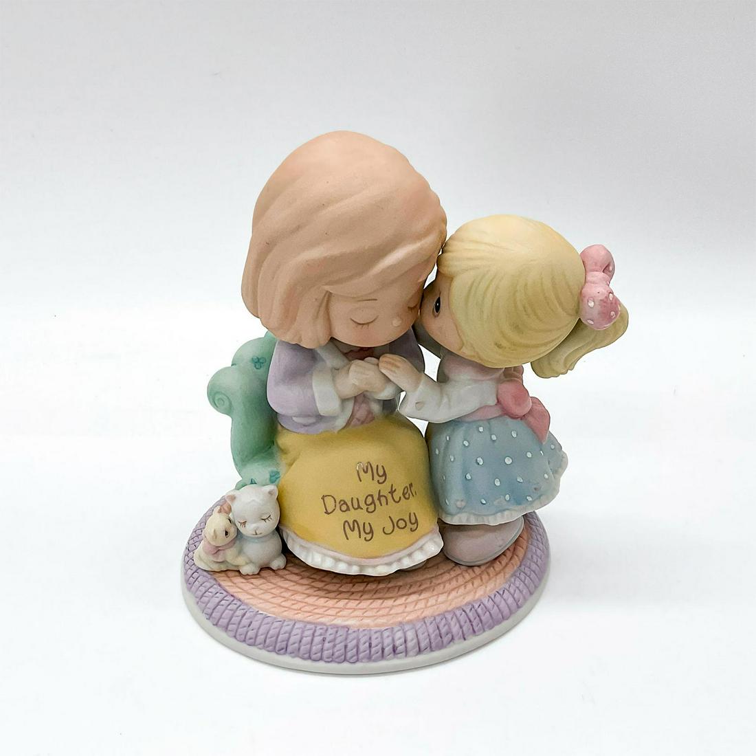 Precious Moments Figurine, My Daughter, My Joy: Mother Daughter holding hands. Precious Moments backstamp. Issued: 2006 Dimensions: 3.75"W x 4.5"H Manufacturer: Precious Moments Country of Origin: United States