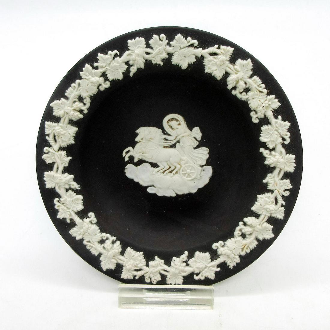 Vintage Wedgwood Black Basalt Jasperware Small Plate: Decorated with classical image and grape vine sprigging around rim in high relief. Wedgwood impressed backstamp. Dimensions: 4.25" Diameter Manufacturer: Wedgwood Country of Origin: England