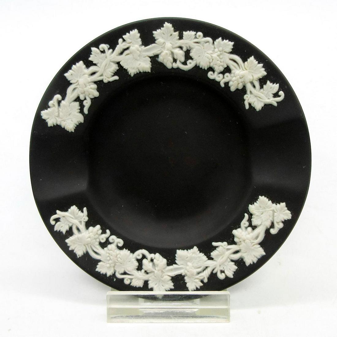 Vintage Wedgwood Black Basalt Jasperware Small Plate: Decorated with grape vine sprigging around rim in high relief. Wedgwood impressed backstamp. Dimensions: 3.5" Diameter Manufacturer: Wedgwood Country of Origin: England