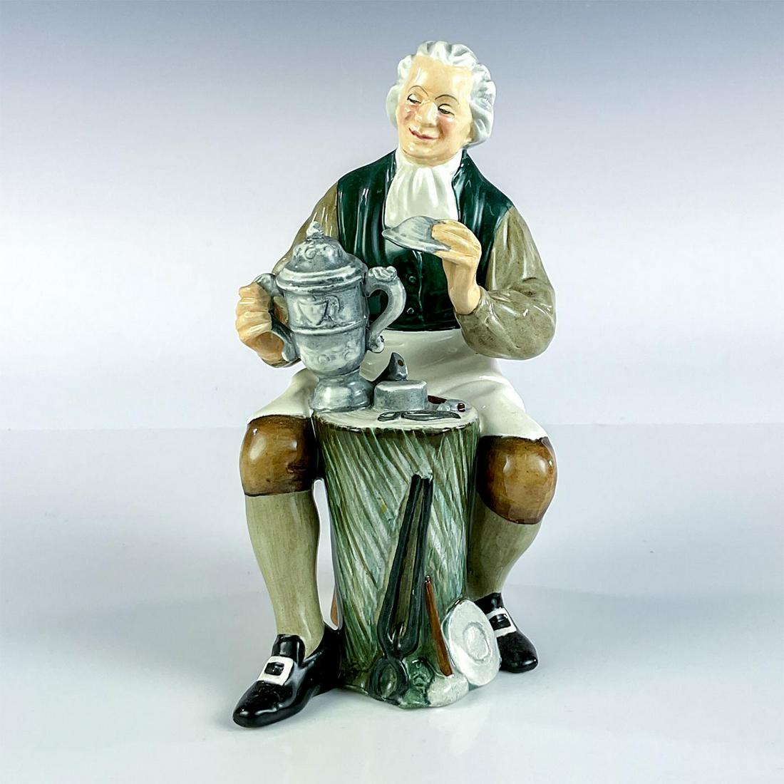 Tinsmith - HN2146 - Royal Doulton Figurine: Artist: Mary Nicoll Issued: 1962 - 1967 Dimensions: 6.5"H Manufacturer: Royal Doulton Country of Origin: England