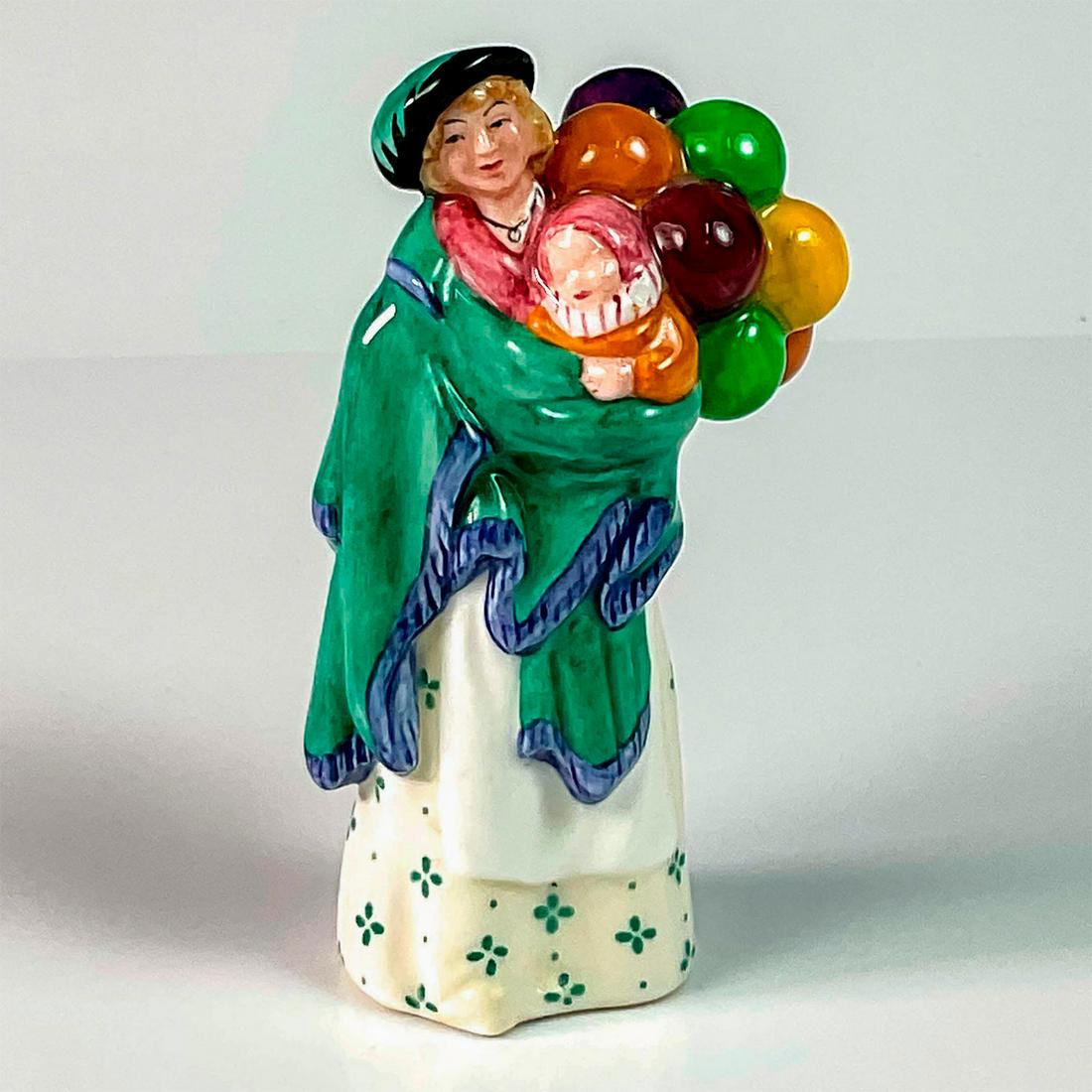Balloon Seller - HN2130 Mini - Royal Doulton Figurine: Artist: Leslie Harradine Issued: 1989 - 1991 Dimensions: 3.75"H Manufacturer: Royal Doulton Country of Origin: England