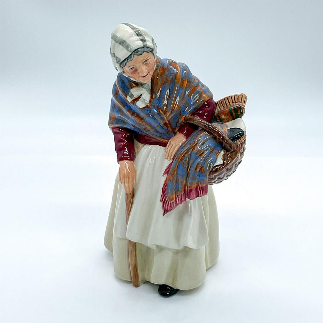 Royal Doulton Figurine, Grandma HN2052: Part of the Golden Years collection. Royal Doulton backstamp. Artist: Leslie Harradine Issued: 1950 - 1959 Dimensions: 6.75"H Manufacturer: Royal Doulton Country of Origin: England