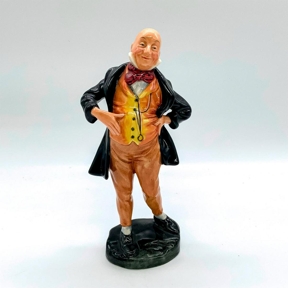 Mr. Micawber HN2097 - Royal Doulton Figurine: Dickens Series Three. Royal Doulton backstamp. Artist: Leslie Harradine Issued: 1952 - 1967 Dimensions: 7.5"H Manufacturer: Royal Doulton Country of Origin: England