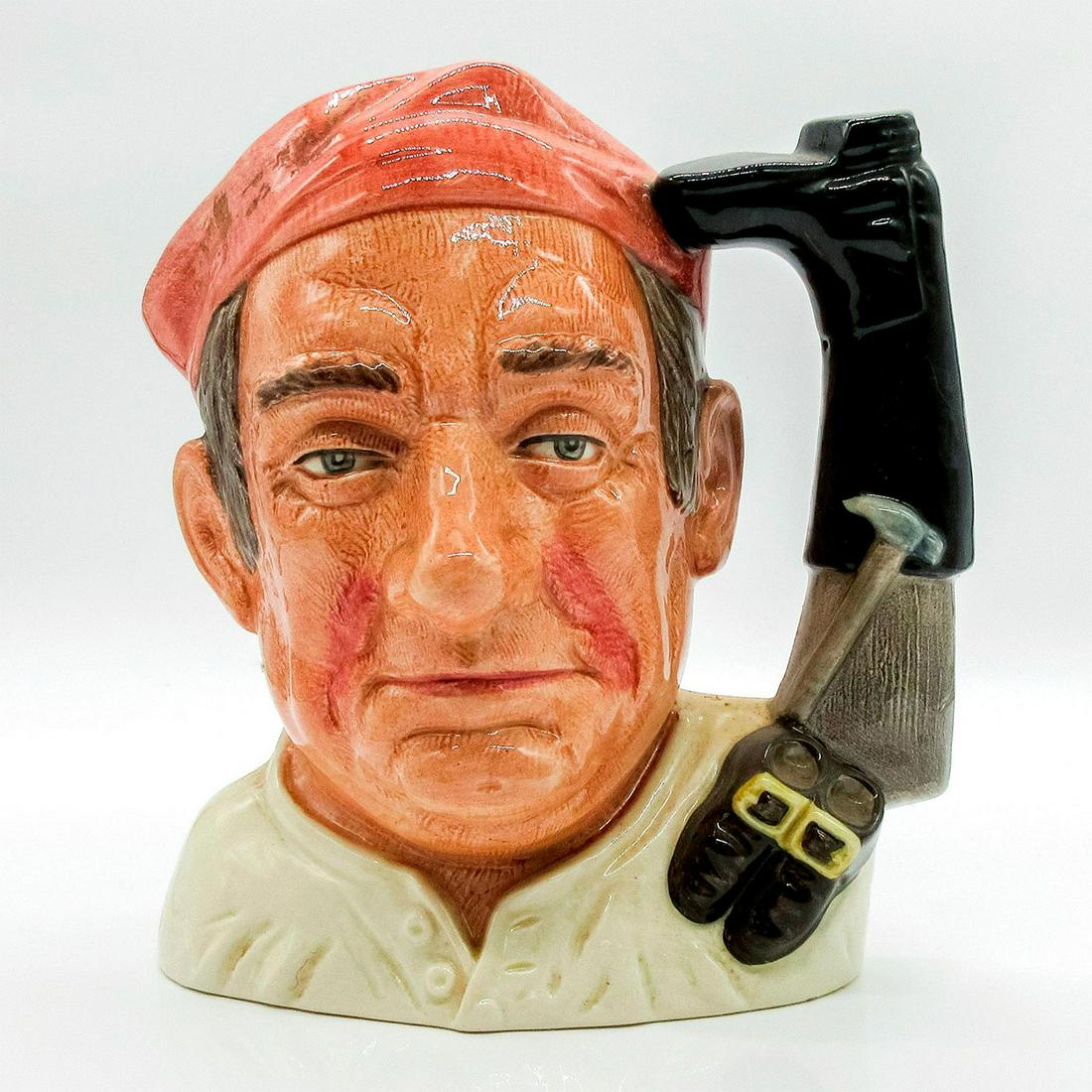 Bootmaker D6572 - Large - Royal Doulton Character Jug: Salmon cap, white shirt. Series: Characters From Williamsburg. Royal Doulton backstamp. Artist: David B. Biggs Issued: 1963 - 1983 Dimensions: 7.5"H Manufacturer: Royal Doulton Country of Origin:<