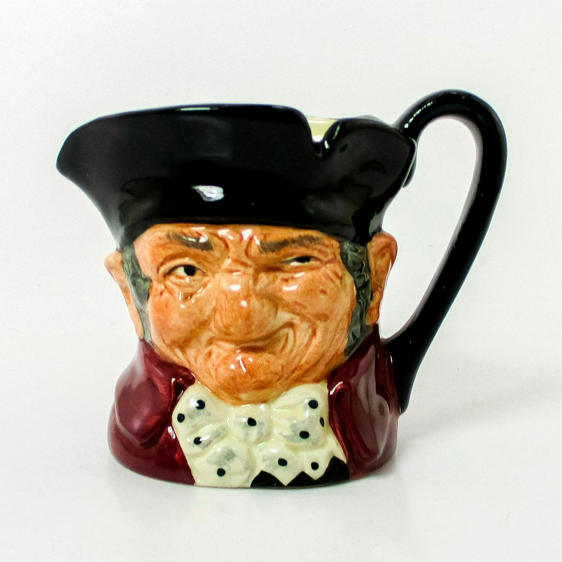Old Charley Higbee D6791 - Small - Royal Doulton Character Jug: Variation Two. Black hat; maroon coat; black polka-dot bow tie. Royal Doulton and Higbee backstamp. Comes with Certificate of Authenticity. Artist: Charles Noke Issued: 1987 - 1987 Dimensions: 3.25"H 