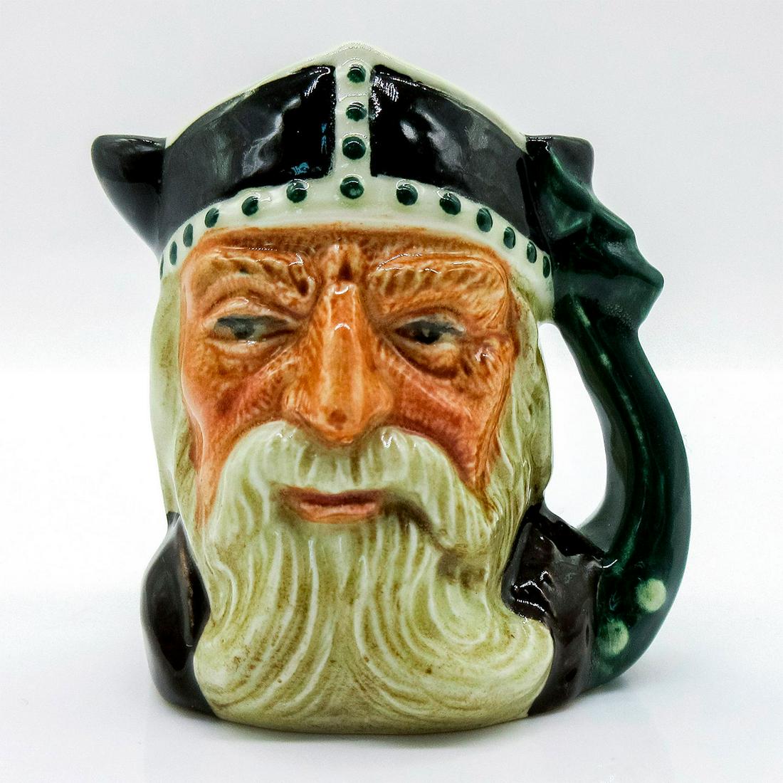 Viking D6526 - Mini - Royal Doulton Character Jug: Black, green, and brown. Royal Doulton backstamp. Artist: Max Henk Issued: 1960 - 1975 Dimensions: 2.5"H Manufacturer: Royal Doulton Country of Origin: England