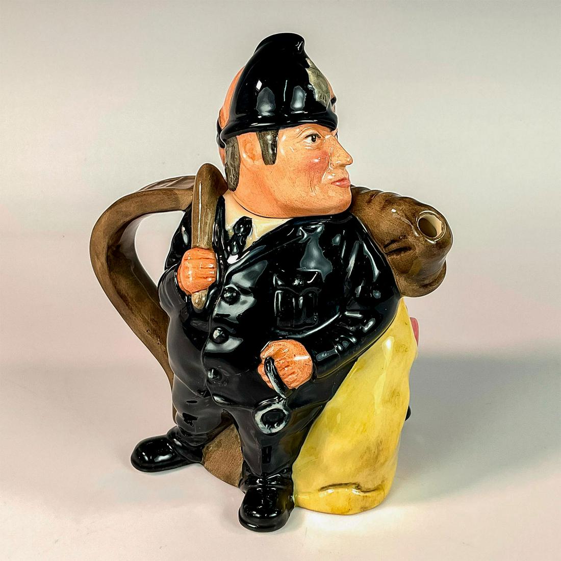 Policeman and Felon D7174 - Royal Doulton Teapot: Policeman: navy uniform; Felon: brown overcoat; black waistcoat, leopard skin pants. Royal Doulton backstamp. Artist: Anthony Cartlidge Issued: 2002 Dimensions: 6.5"H Edition Number: 205 Edition Size: