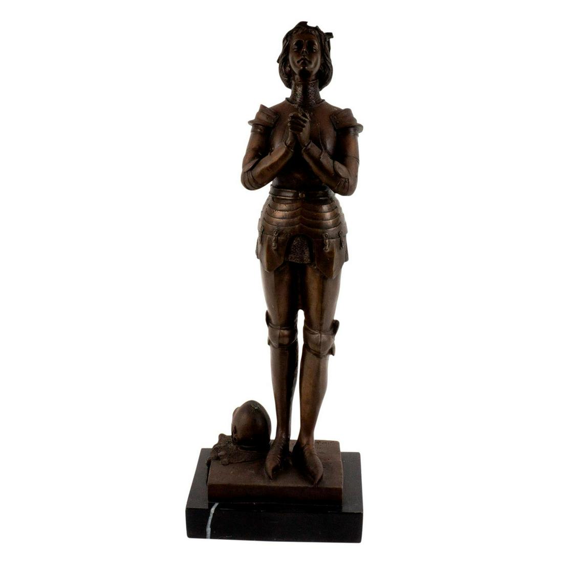 Marius Mercie (France, 1845-1916) Signed Bronze Sculpture: "Jeanne d'Arc." Depicts Joan of Arc, patron saint and heroine of France, dressed in armor, standing with hands clasped and closed eyes. Attached to stone base. Artist signed back left. Art