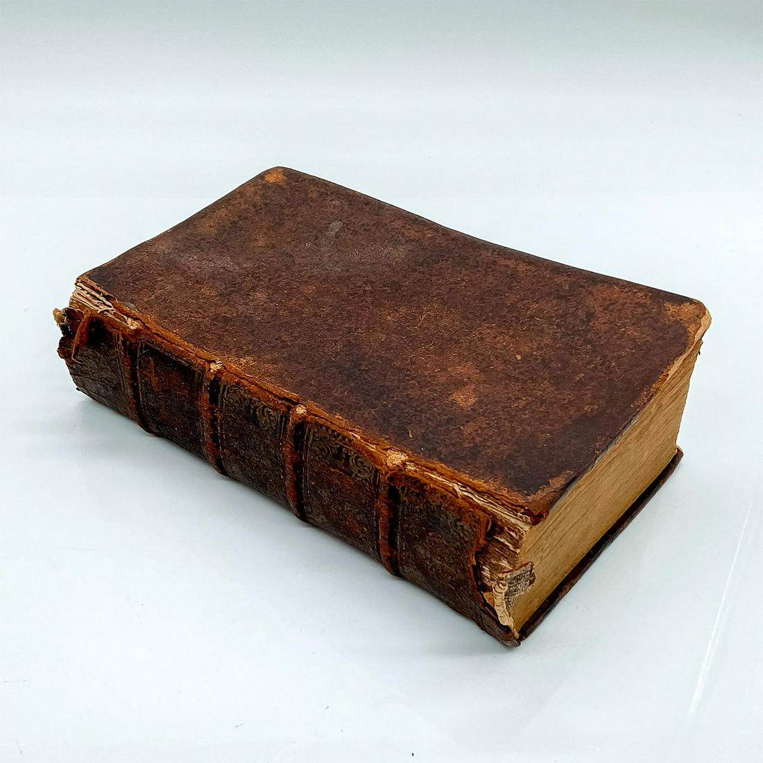 Hardcover Book, Das Krancken- und Sterbe-Bett: The Sick and Dying Bed Illuminated with the Word of Life. Over 800 pages religious scripture in German. Artist: Bernhard Walther Marperger Issued: 1735 Dimensions: 4.25"L x 2.25"W x 6.75"H Manufacture