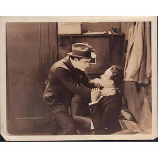 Photo From Strange Idols, Actors: Scene from film Strange Idols, featuring Dustin Farnum and Richard Tucker. Title of film and other information on verso. Issued: 1922 Dimensions: 10.25"W x 8"H