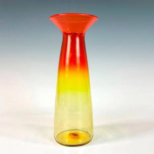 Vintage Blenko Glass Company Amberina Vase: A wide brim red and yellow vessel. Blenko Glass Company acid mark on the base. Dimensions: 11.25"H x 4.25"dia. Manufacturer: Blenko Glass Company Country of Origin: United States