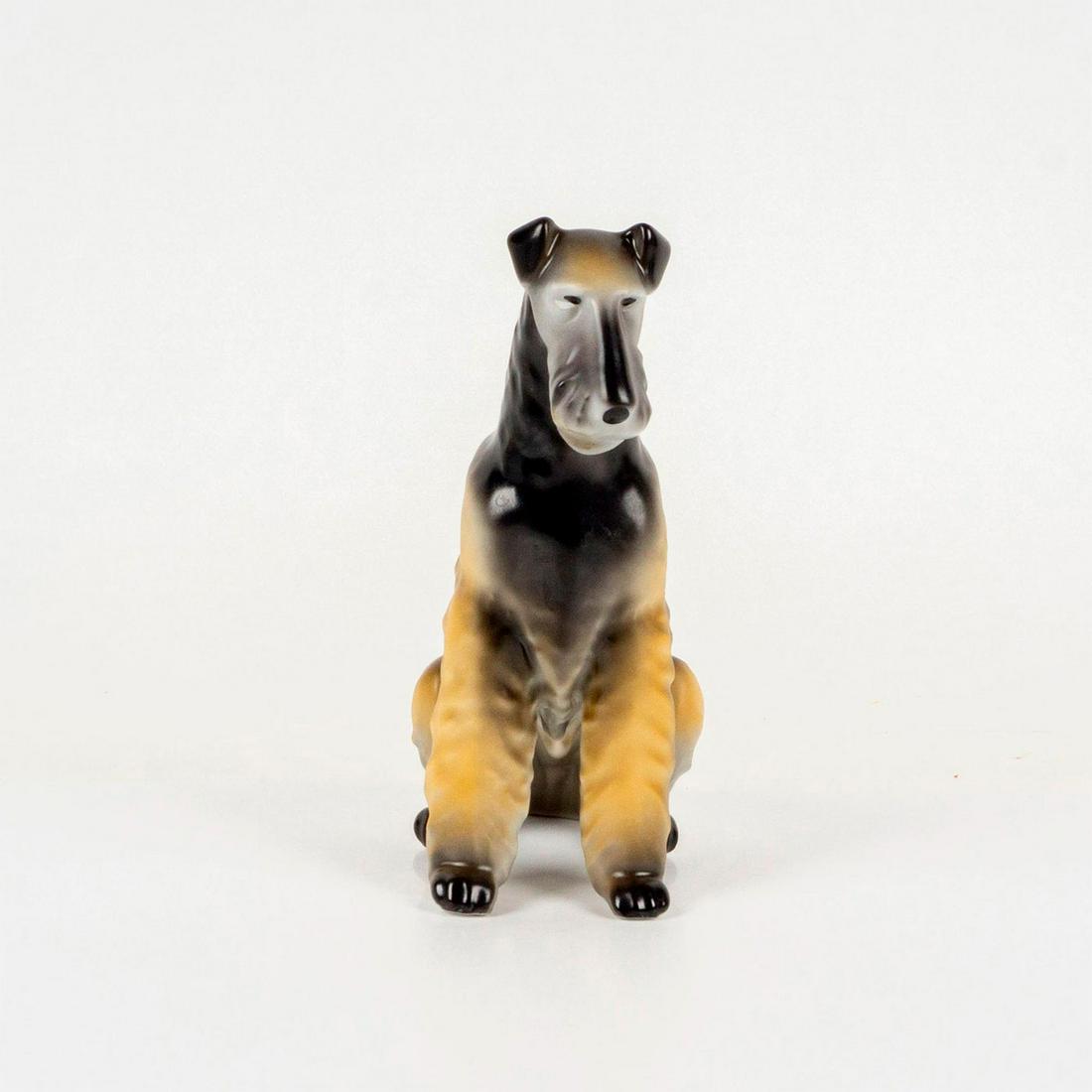 Hollohaza Hungarian Porcelain Dog Figurine: Hand painted figure of an adorable seated Fox Terrier. Model number 1831 21. Marked on the base. Dimensions: 7"L x 3"W x 7"H Country of Origin: Hungary