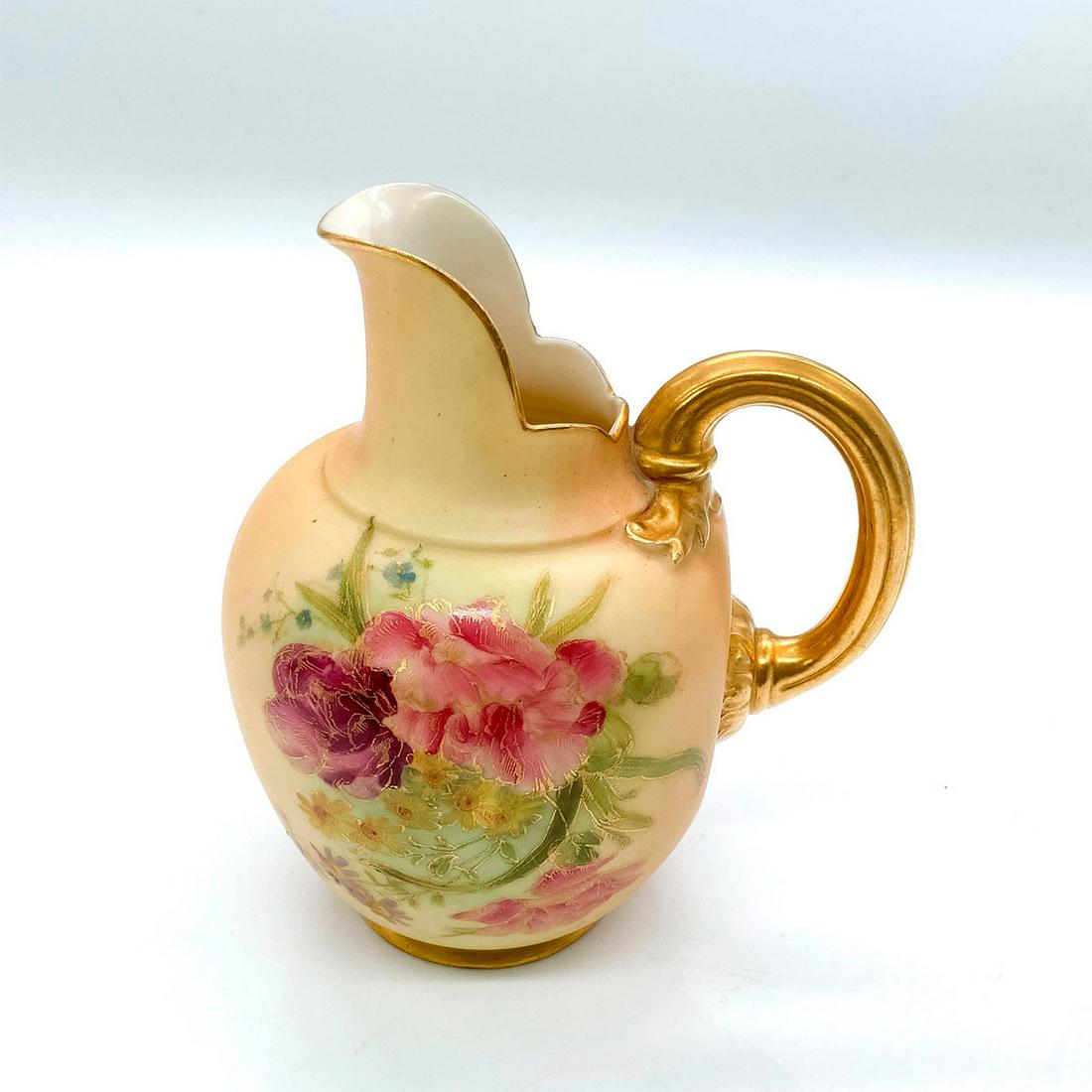 Royal Worcester Gilt Ewer: Ornately decorated with beautifully detailed floral pattern. Royal Worcester backstamp. Dimensions: 3.75"L x 3"W x 4.5"H Manufacturer: Royal Worcester Country of Origin: England