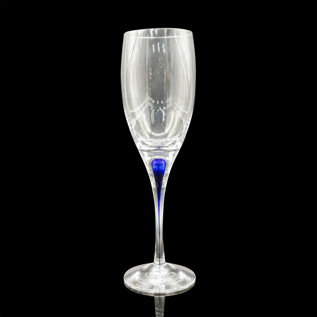 Orrefors White Wine Glass, Intermezzo Blue: Clear with blue coloration in stem. Orrefors etched backstamp and factory sticker. Comes with original box. Dimensions of box: 8.25"L x 5"W x 5"H. #Orrefors Dimensions: 8" H Manufacturer: Orrefors Cou