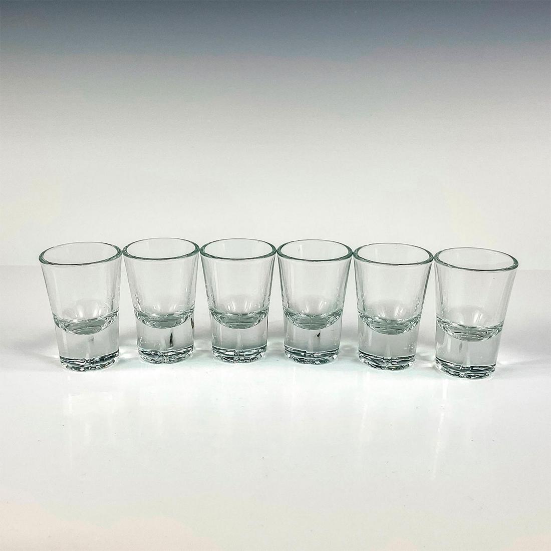 6pc Rosendahl Copenhagen Shot Glasses, Grand Cru: Colorless translucent glass; thick glass bottoms with an R impressed to bases. Part of the Grand Cru collection. Approximately 2.75"H each. Box dimensions: 6"L x 4"W x 3"H. This item has its original 