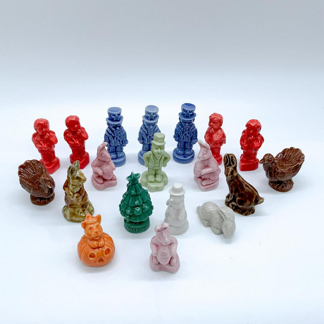 19pc Vintage Wade Holiday Porcelain Figurines: Precious hand painted Whimsies collection are hand painted in warm muted tones and have a nice weight to them despite their size. Piece range from 0.75 to 2.25 inches in height and up to 1.75 inches i