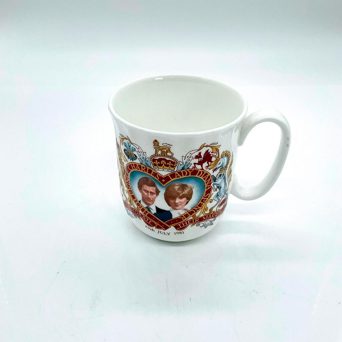 Dennis and Sons, Charles and Diana Commemorative Mug: Bone china mug commemorative prince Charles and Lady Diana's marriage in 1981. Dennis and Sons Hull backstamp on base. This item has no reserve. Dimensions: 4.25"W x 4"H Manufacturer: Dennis and Sons