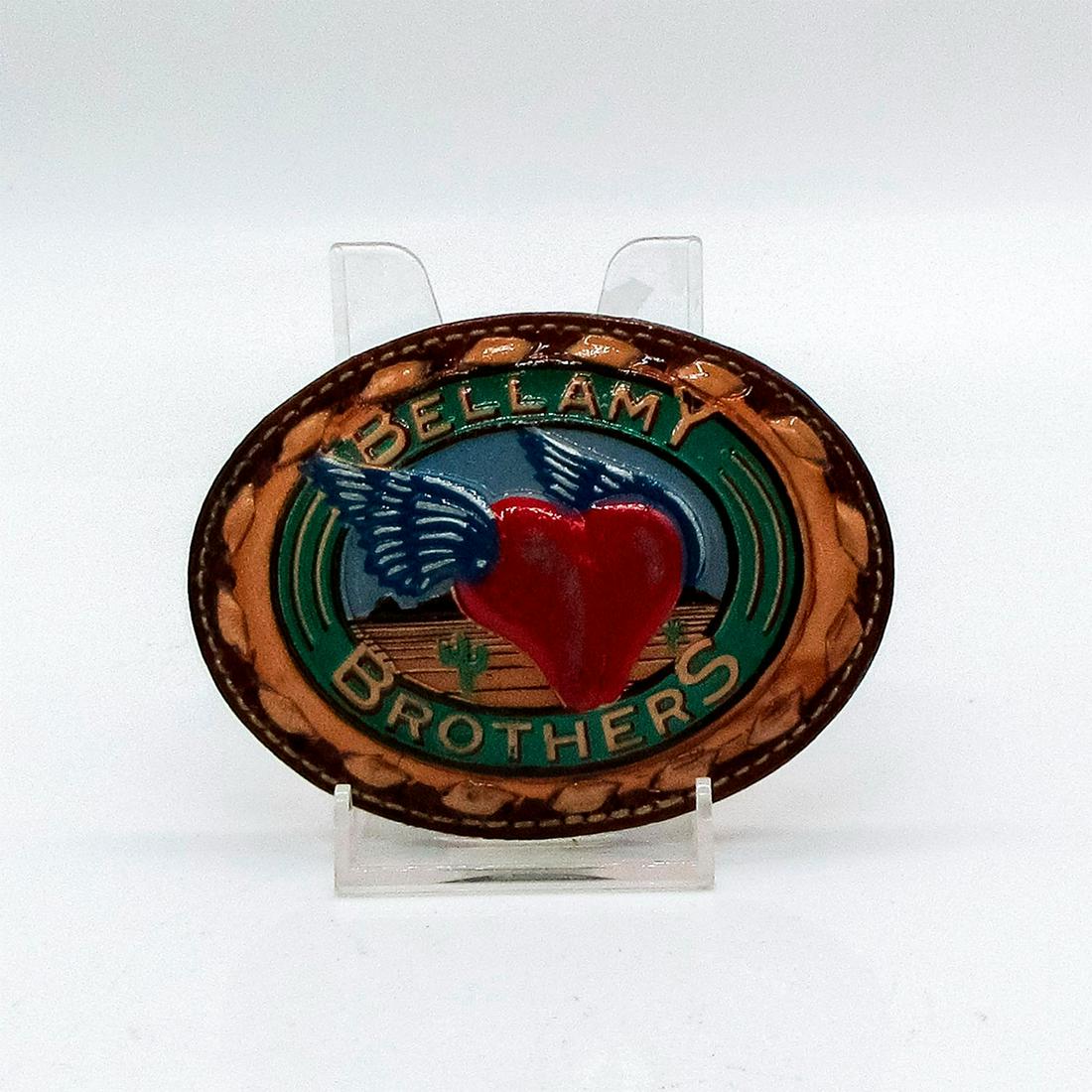 Bellamy Brothers Country Music Belt Buckle: Featuring the same cover art from their Greatest Hits album, this piece depicts heart with wings and cactus in the background. Wright backstamp. #bellamy #brothers #belt #buckle #heart #wings Issued: 