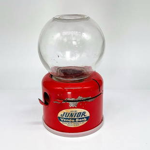 Original Junior Venda-Bank Toy Gumball Machine: A child's gumball bank made from all metal with a glass globe. Junior Venda-Bank sticker on side. Issued: c. 1950 Dimensions: 7"H x 4.25"Dia. Manufacturer: United Metal Products Inc. Country of Origin