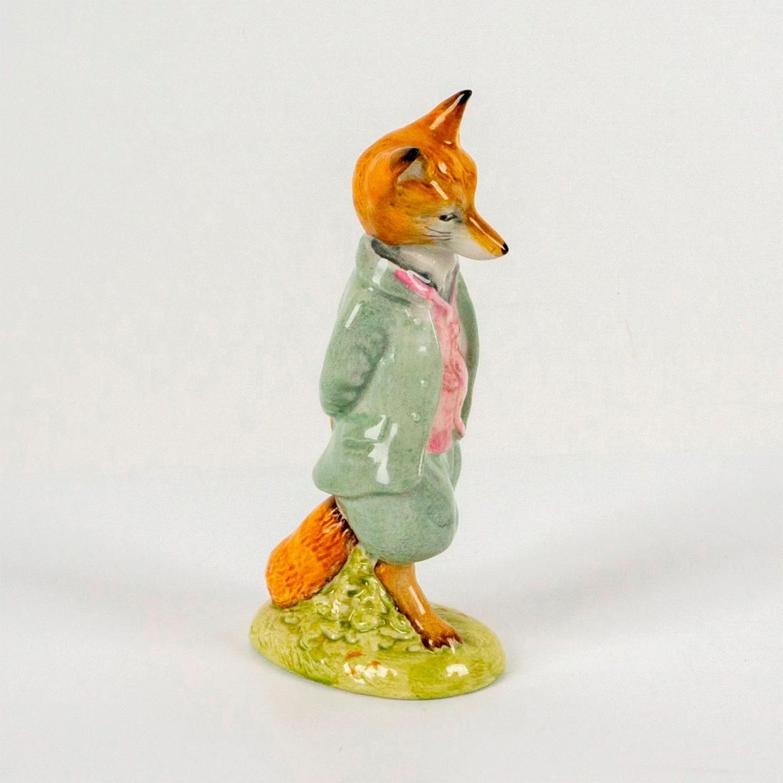 Foxy Whiskered Gentleman - Beswick - Beatrix Potter Figurine: Depicts fox character dressed in green coat and trousers with a pink waistcoat. Beswick backstamp. Dimensions: 2.25"L x 1.5"W x 5"H Manufacturer: Beatrix Potter Country of Origin: England