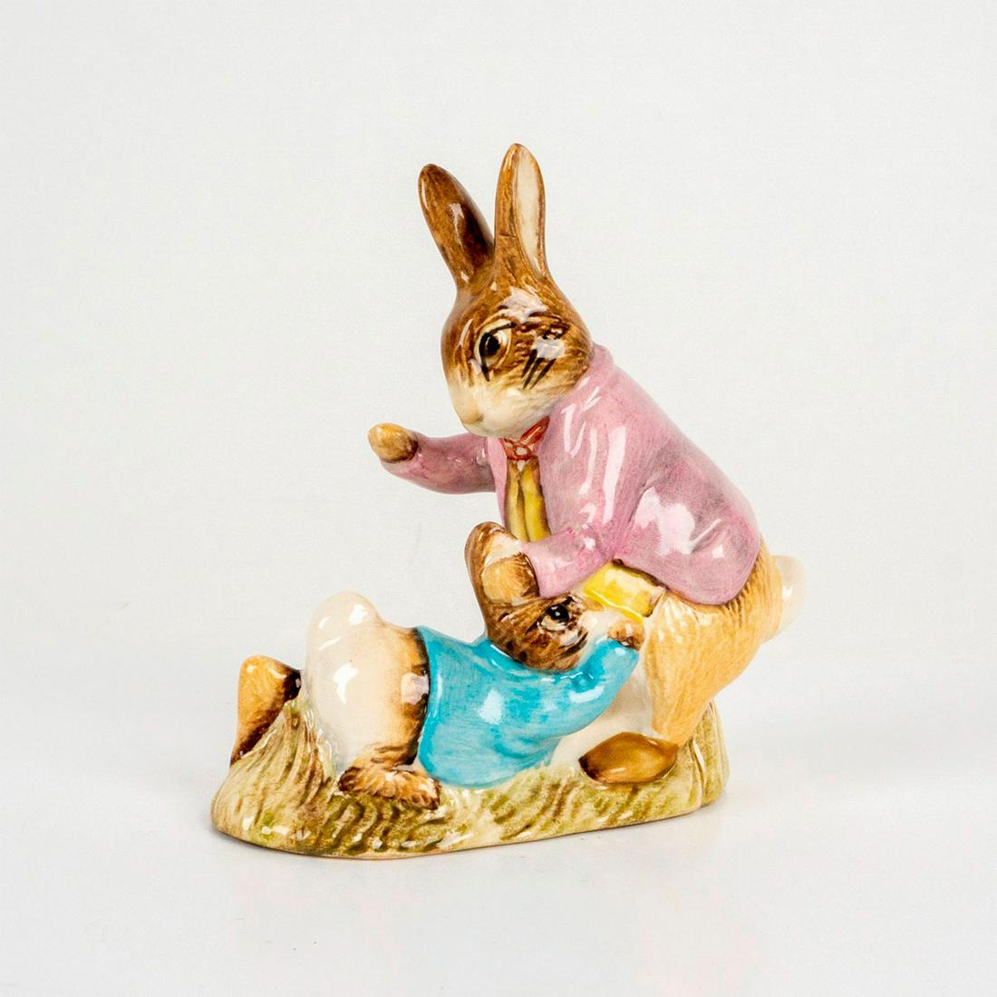 Mr. Benjamin Bunny - Beswick - Beatrix Potter Figurine: Depicts an adult bunny in a purple coat grabbing the ears of a younger bunny. Beswick backstamp. Dimensions: 4"L x 1.75"W x 4"H Manufacturer: Beatrix Potter Country of Origin: England