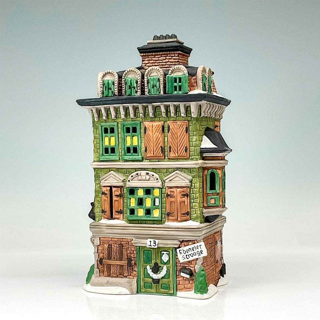 Department 56 Figure, The Flat of Ebenezer Scrooge: Part of the Dickens Village Series. Hand painted porcelain, depicting the neglected home of the main Dickens' character. This item has its original box with dimensions: 8"L x 4.5"W x 9.75"H. Issued: 1